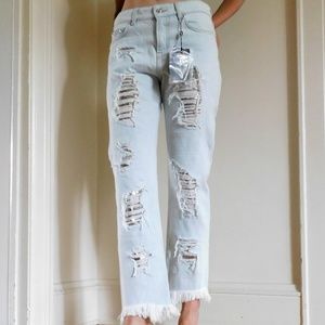 frayed & distressed light wash ankle jeans